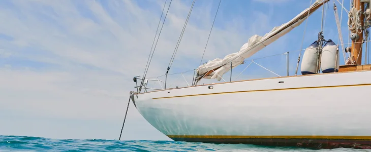 Empty boat docked on the ocean in open water